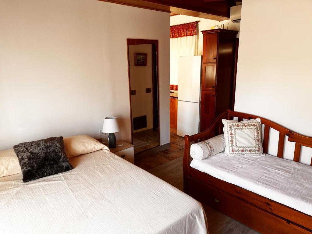 Posteľ alebo postele v izbe v ubytovaní Apartamentos Inter Gandia Playa