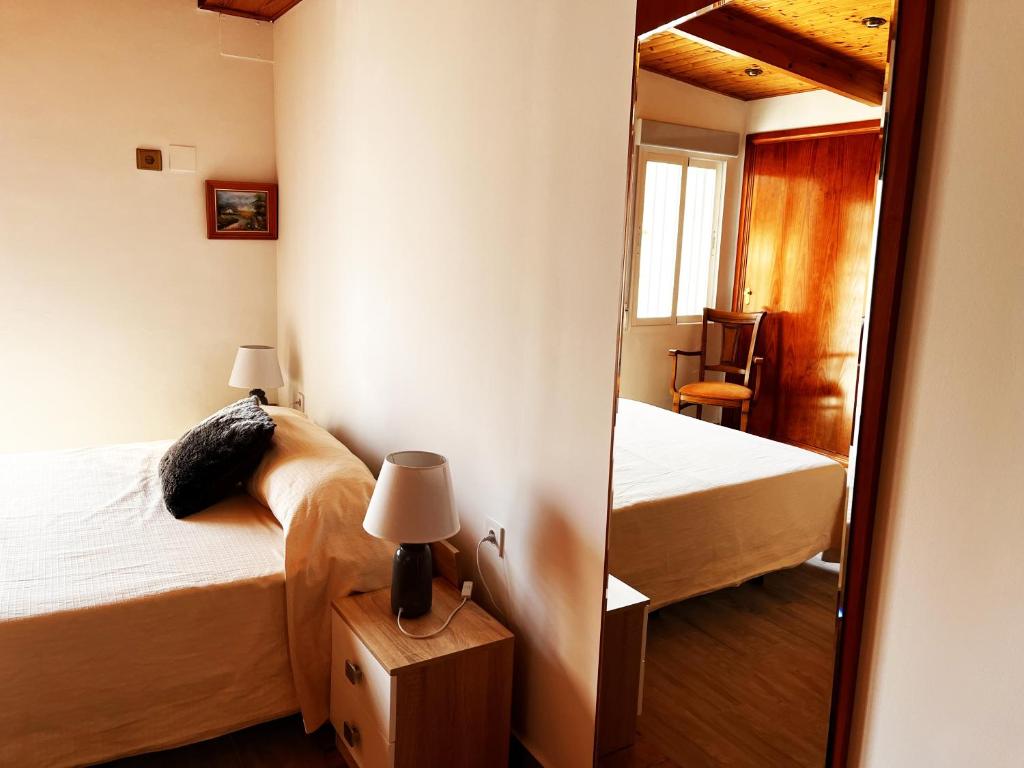 Posteľ alebo postele v izbe v ubytovaní Apartamentos Inter Gandia Playa