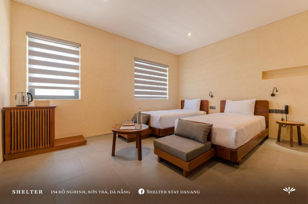 Giường trong phòng chung tại Shelter Stay Da Nang