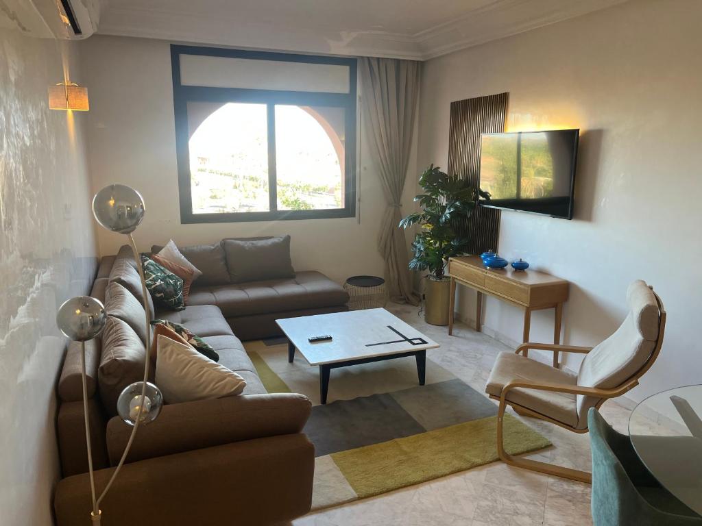 Χώρος καθιστικού στο Appartment le bleu