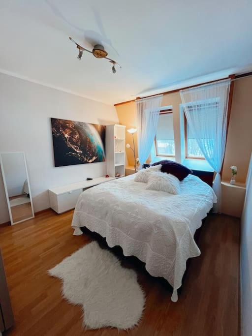Postel nebo postele na pokoji v ubytování Huhtala apartment