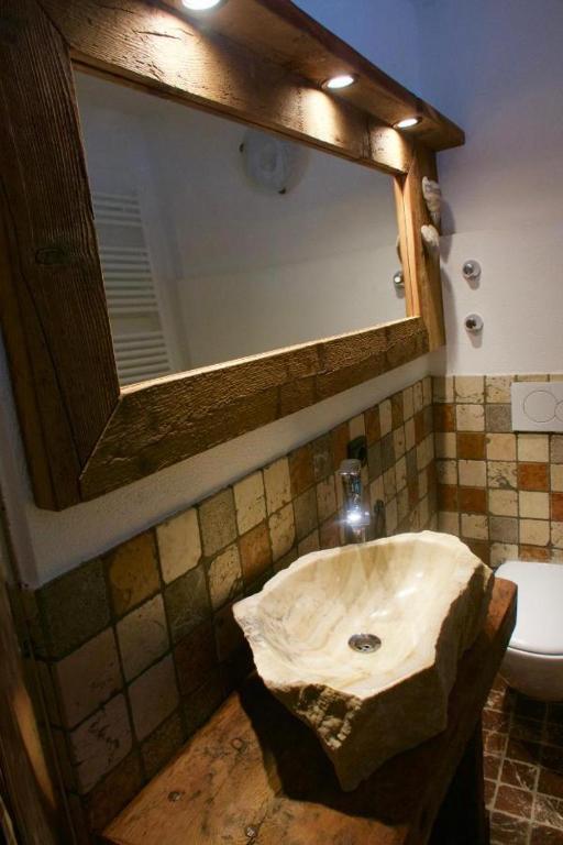 Koupelna v ubytování Agriturismo Baita De L'ALL