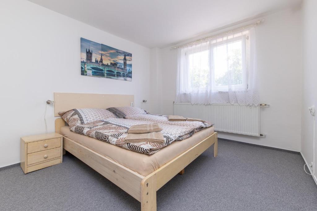 Postel nebo postele na pokoji v ubytování Hotel Pivovar Polička