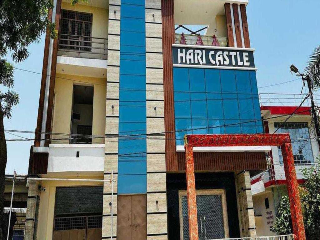 a building with a sign that reads hirm castle at OYO Flagship Hari Castle in Kānpur