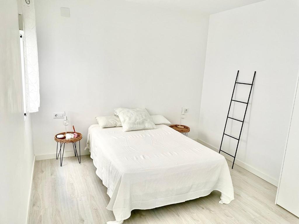 Posteľ alebo postele v izbe v ubytovaní Elegante apartamento 6-8pax AV Palmera 3D 2B