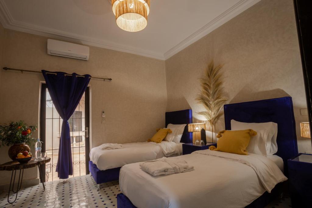 Postel nebo postele na pokoji v ubytování Just V hotel & Spa