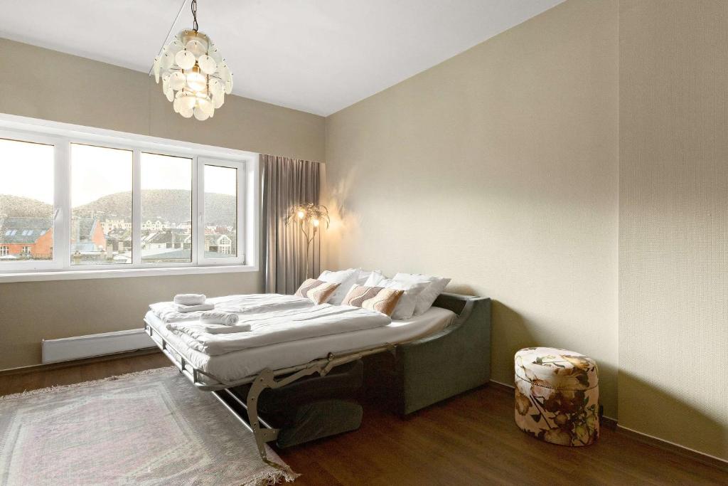 a bed in a room with a window at Ole Bull, Best Western Signature Collection in Bergen