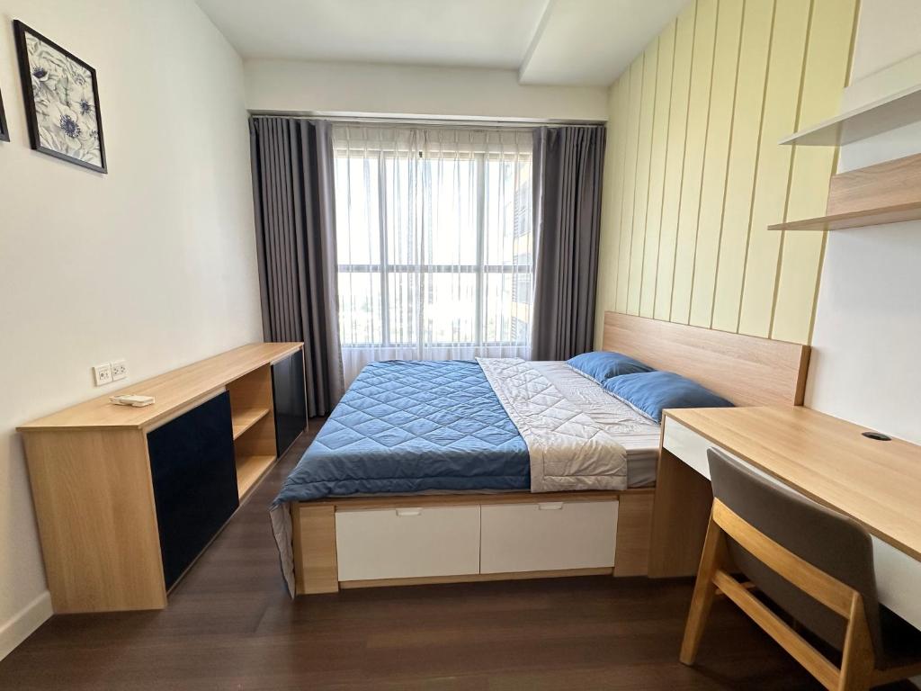 Ένα ή περισσότερα κρεβάτια σε δωμάτιο στο 2 Bedrooms At The Sun Avenue In The Center Of District 2 With Overflow Swimming Pool