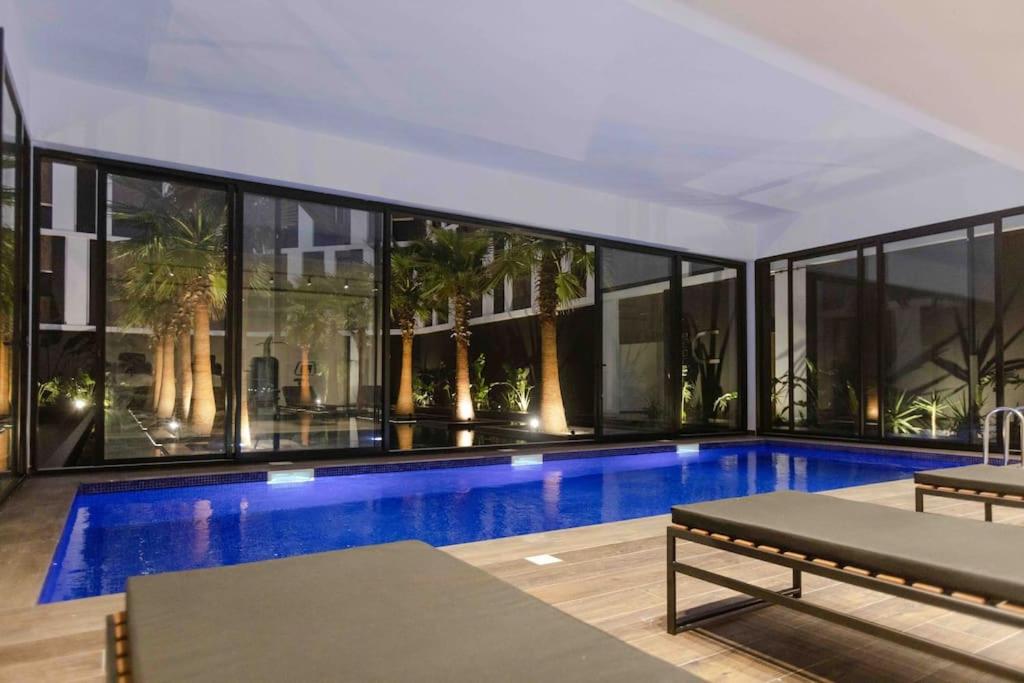 Bazén v ubytování S+1 très haut standing avec piscine et fitness nebo v jeho okolí