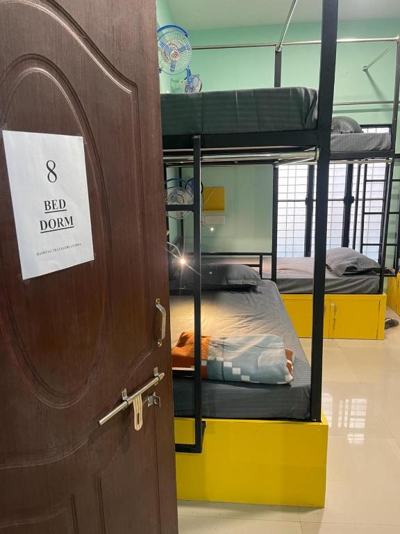 Postel nebo postele na pokoji v ubytování Hashtag Traveller's Ayodhya