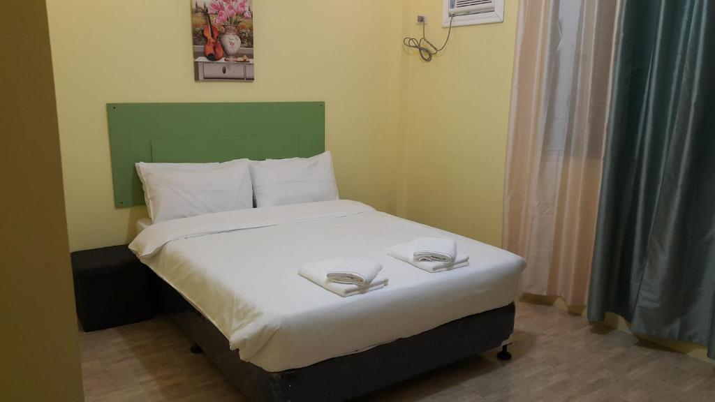 Postel nebo postele na pokoji v ubytování HOTEL BNL
