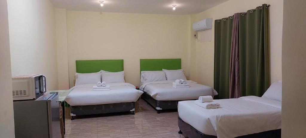 Postel nebo postele na pokoji v ubytování HOTEL BNL