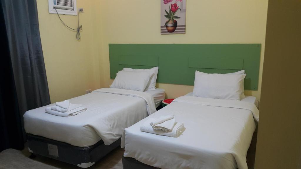 Postel nebo postele na pokoji v ubytování HOTEL BNL