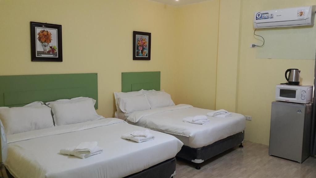 Postel nebo postele na pokoji v ubytování HOTEL BNL