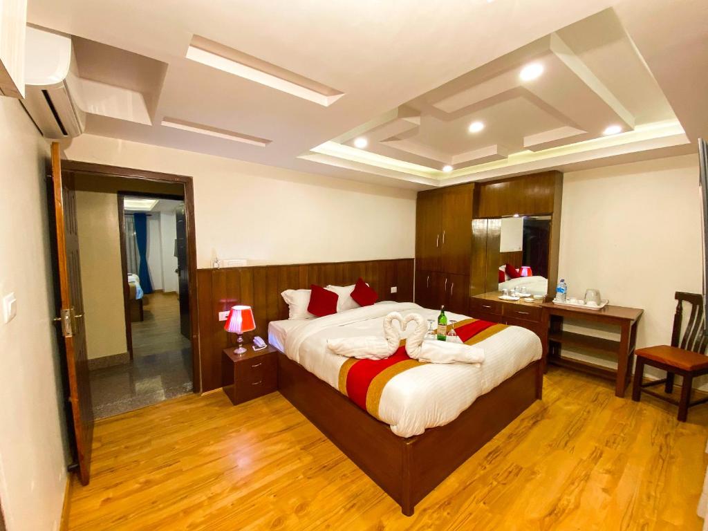 Postel nebo postele na pokoji v ubytování Hotel Abi International