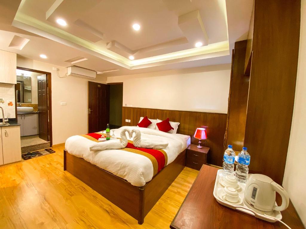 Postel nebo postele na pokoji v ubytování Hotel Abi International