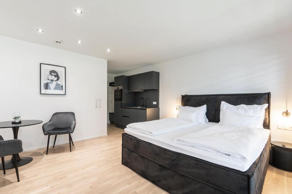 Letto o letti in una camera di Village by Maier - kontaktloser Check-in