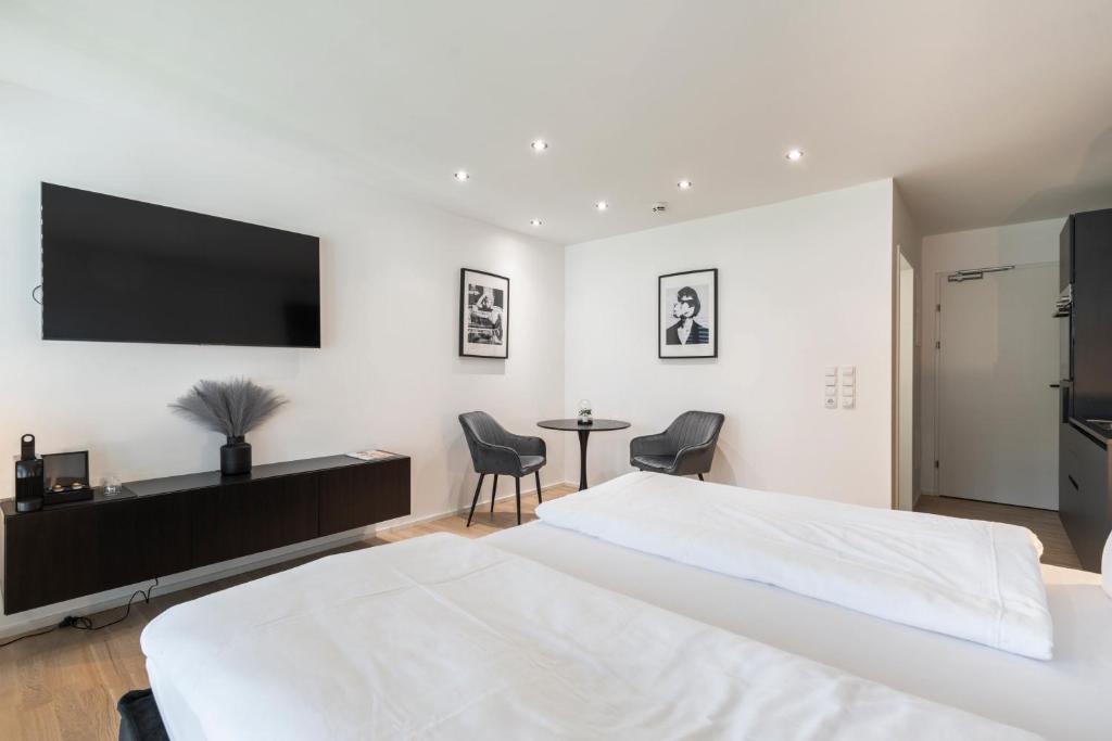 Letto o letti in una camera di Village by Maier - kontaktloser Check-in