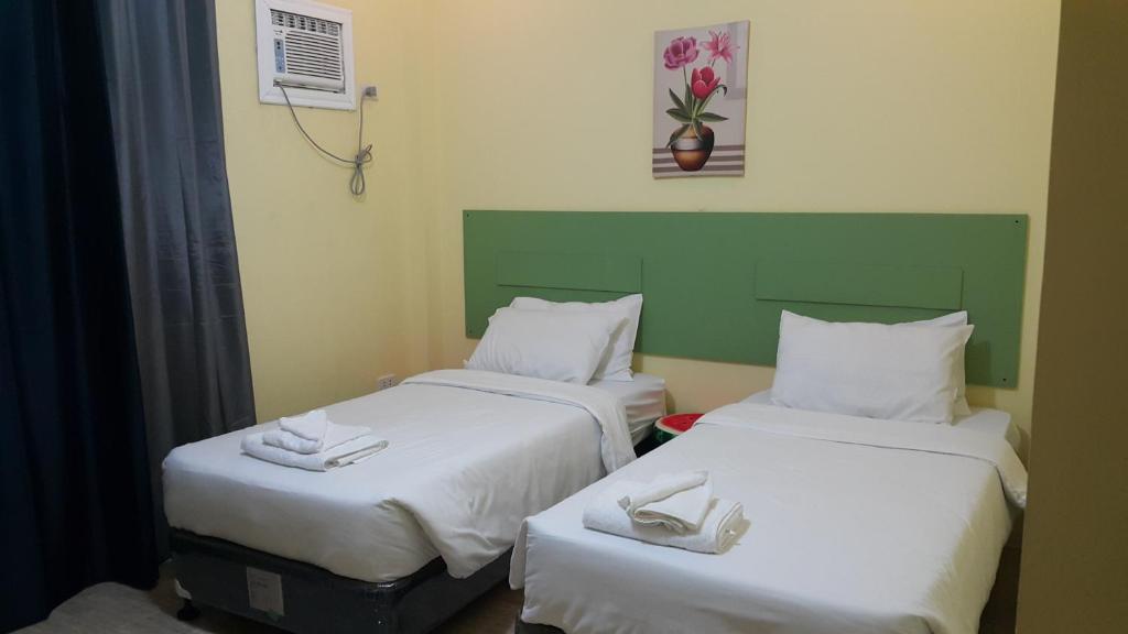 Postel nebo postele na pokoji v ubytování HOTEL BNL