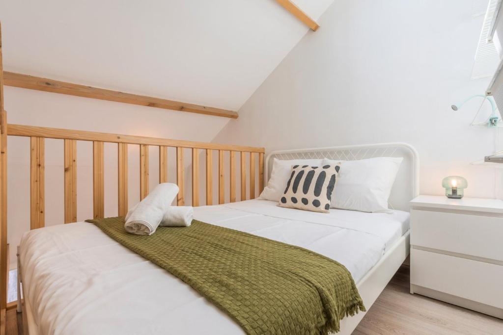 Posteľ alebo postele v izbe v ubytovaní Emplacement central pour ce studio Vieux Lille