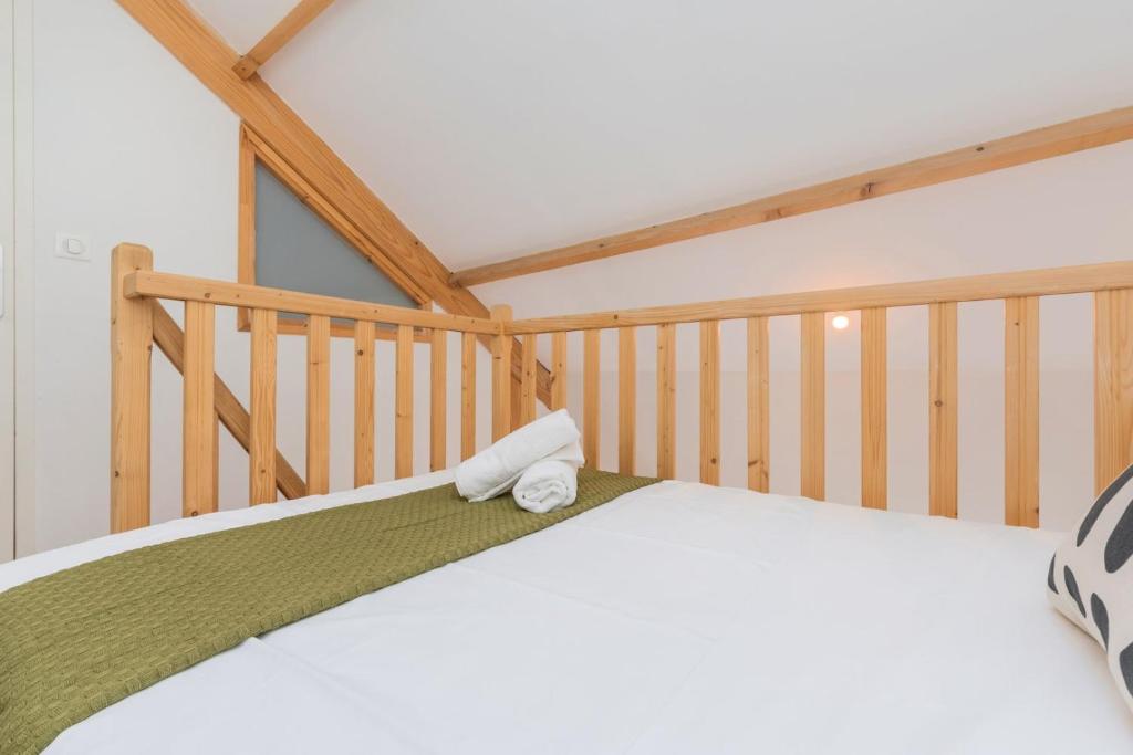 Posteľ alebo postele v izbe v ubytovaní Emplacement central pour ce studio Vieux Lille