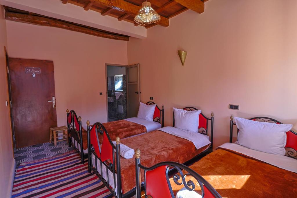 Postel nebo postele na pokoji v ubytování Tamatert Guest House