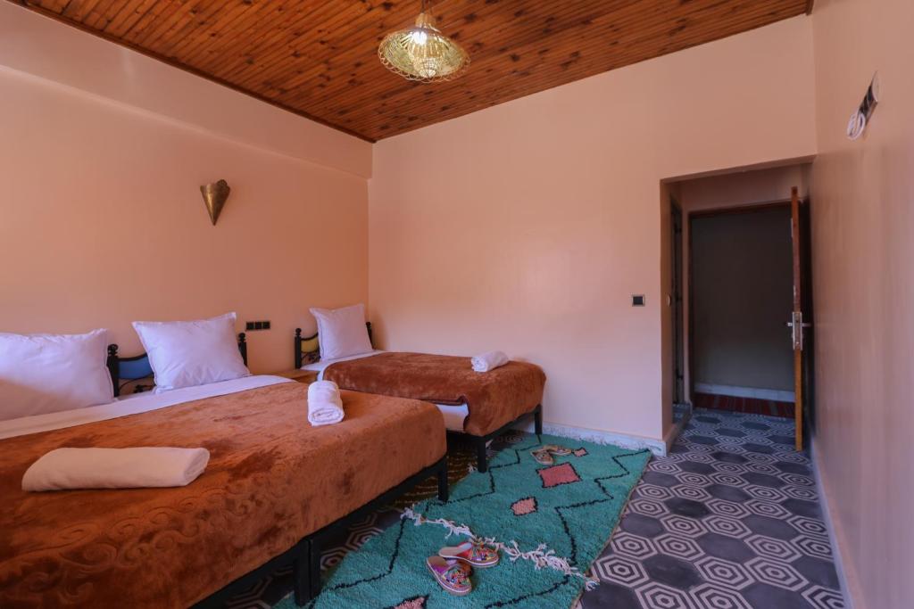 Postel nebo postele na pokoji v ubytování Tamatert Guest House