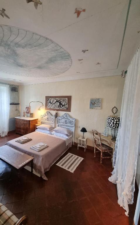 Posteľ alebo postele v izbe v ubytovaní La Corte B&B