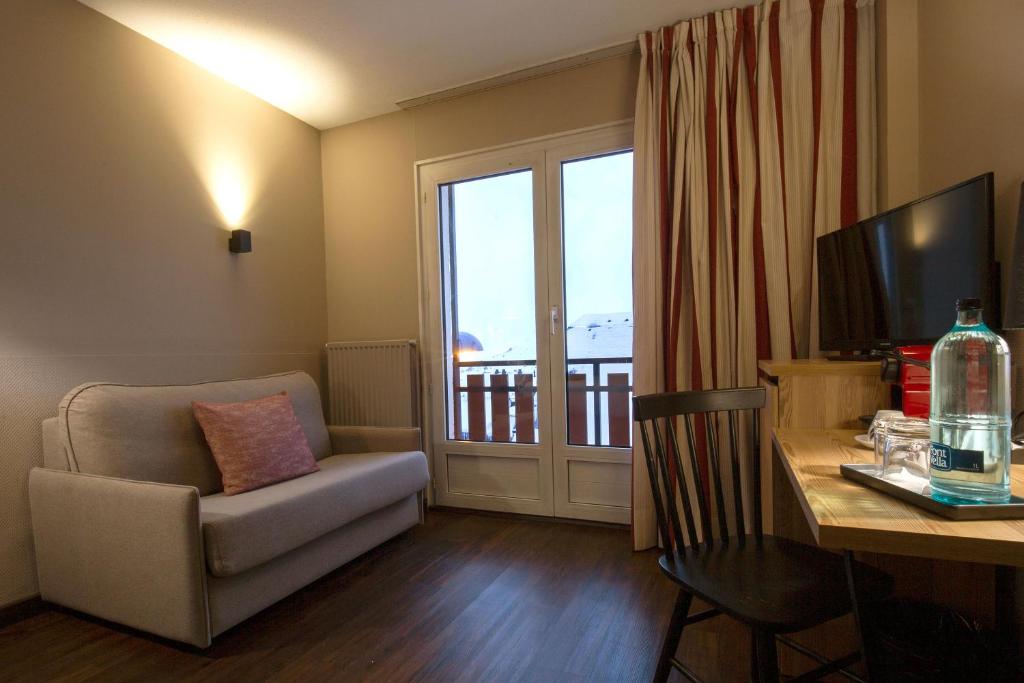 TV a/nebo společenská místnost v ubytování Hotel Grand Pas