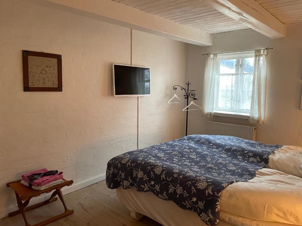 Postel nebo postele na pokoji v ubytování pallisgaard B&B