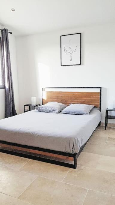 Postel nebo postele na pokoji v ubytování Gîte du Colombier