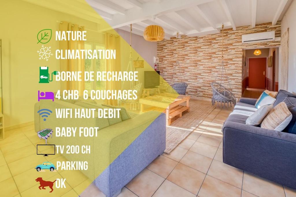 a living room with a couch and a brick wall at Le Grand Cottage Nature Bien-Etre du Tarn entre Toulouse et Albi & Les Cottages du Tarn in Peyrole