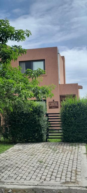 a building with stairs in front of a building at Cantal Bed & Breakfast in El Durazno