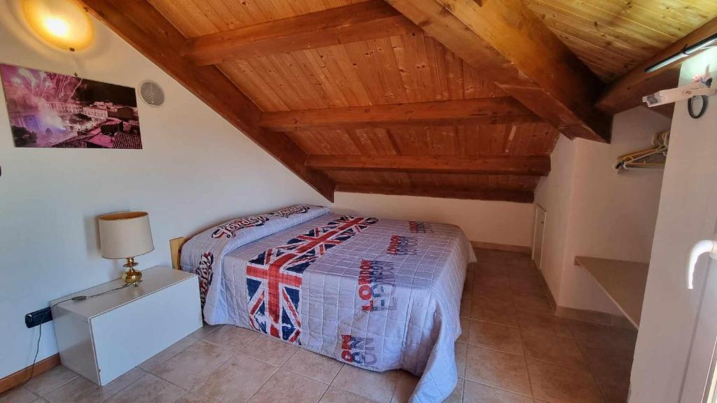 Posteľ alebo postele v izbe v ubytovaní Villa immersa nel verde dell Etna