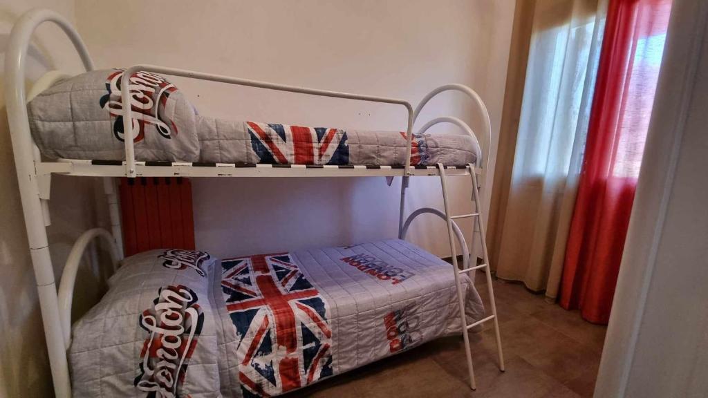 Posteľ alebo postele v izbe v ubytovaní Villa immersa nel verde dell Etna