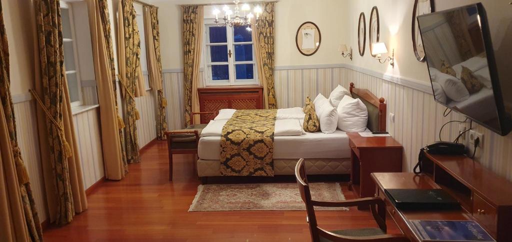 Postel nebo postele na pokoji v ubytování Hotel Leeberghof