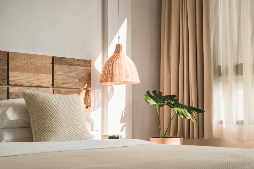 Postel nebo postele na pokoji v ubytování 肇兴溪舍山堂 Creekside Inn