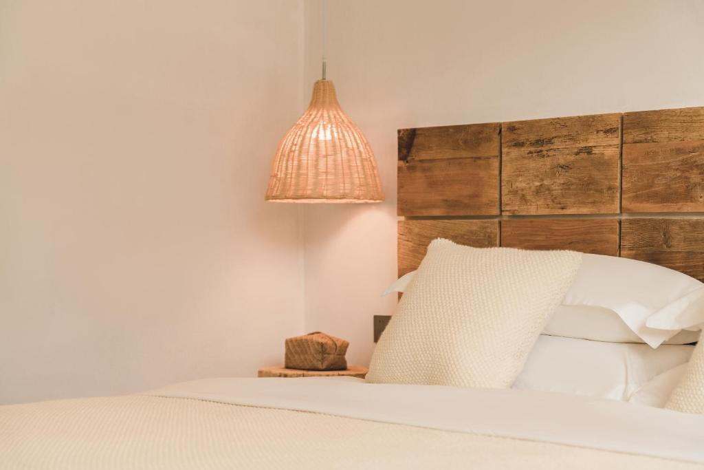 Postel nebo postele na pokoji v ubytování 肇兴溪舍山堂 Creekside Inn