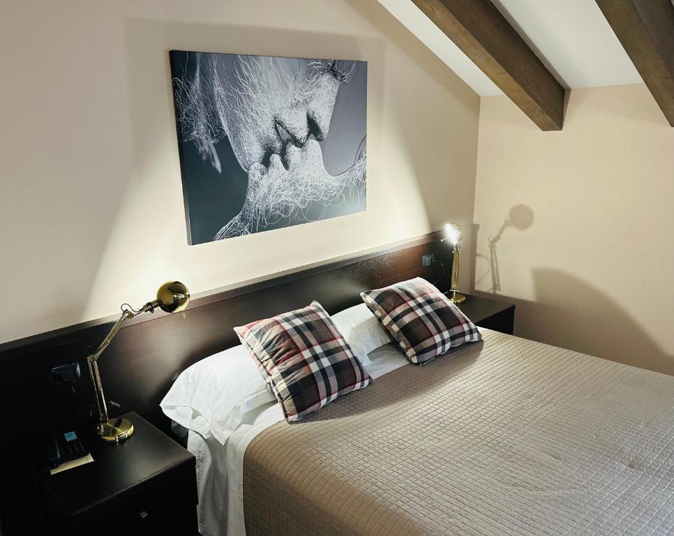 Postel nebo postele na pokoji v ubytování Hotel Malpensa INN Aereoporto