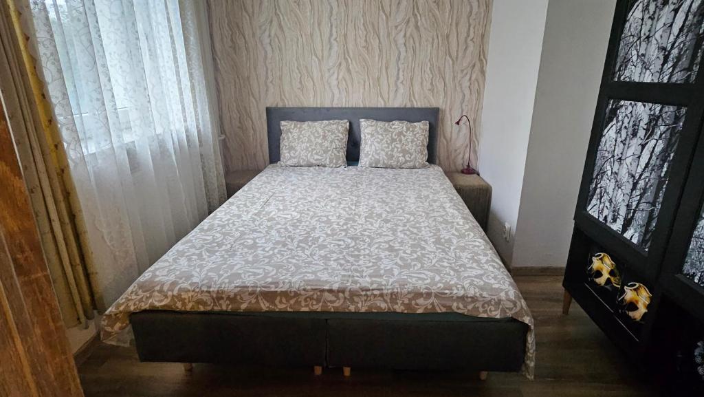 Posteľ alebo postele v izbe v ubytovaní Apartament Góralska