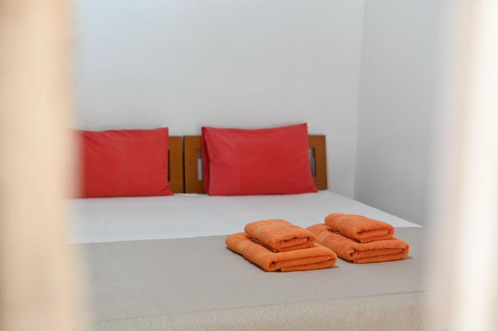 A bed or beds in a room at Guesthouse Agnandi