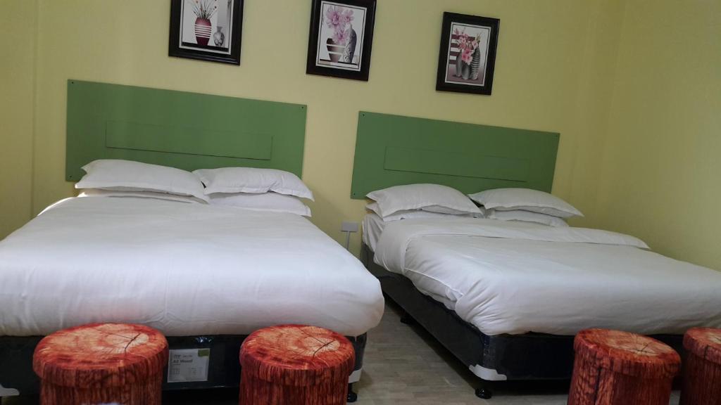 Postel nebo postele na pokoji v ubytování HOTEL BNL