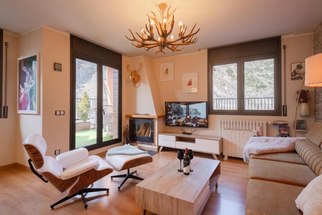 TV a/nebo společenská místnost v ubytování UNIQUE 57m2 Terraza BBQ vista mágica10