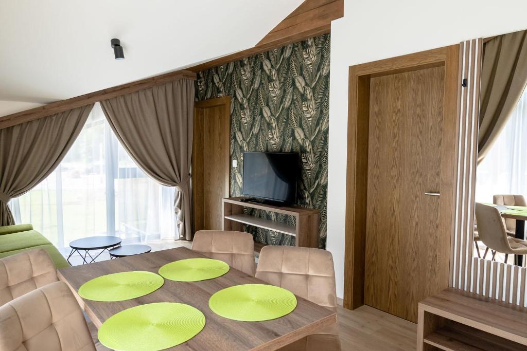 TV a/nebo společenská místnost v ubytování Apartmány Hájenka Oravice