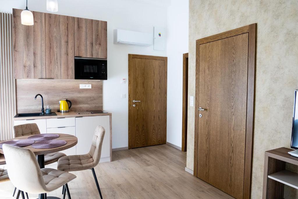 Kuchyň nebo kuchyňský kout v ubytování Apartmány Hájenka Oravice