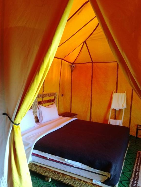Postel nebo postele na pokoji v ubytování Camp Under Stars