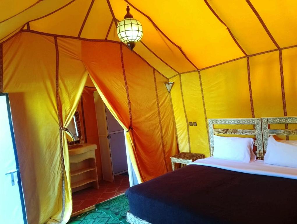 Postel nebo postele na pokoji v ubytování Camp Under Stars