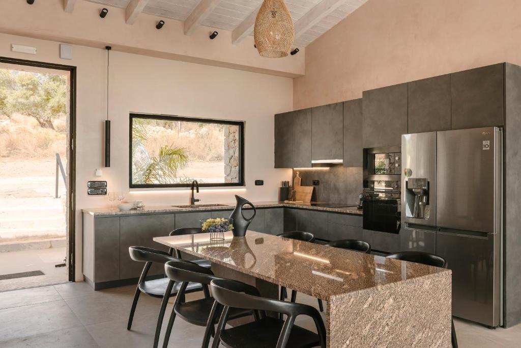 Kuchyň nebo kuchyňský kout v ubytování Petra Tranquila Villa