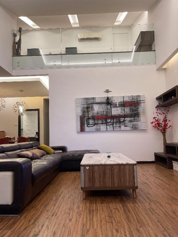 Posezení v ubytování Pelita Commercial Centre Homestay 百丽达商圈民宿 9pax