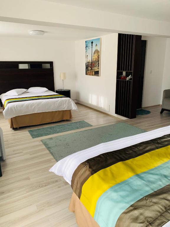 Postel nebo postele na pokoji v ubytování Casa Lazar